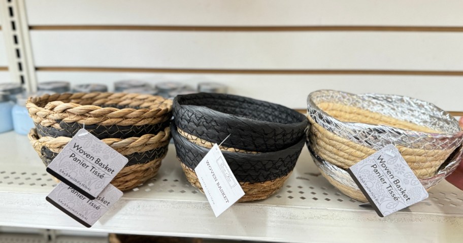 various small Striped Woven Straw Baskets on a shelf