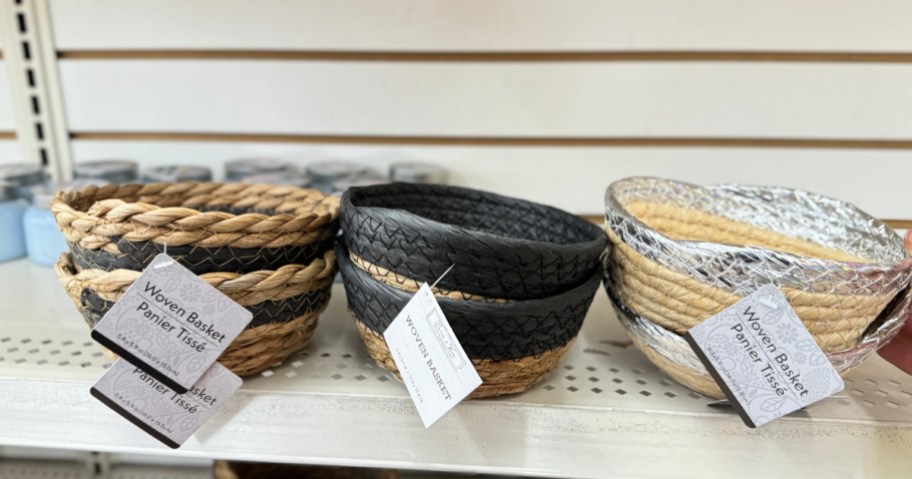 various small Striped Woven Straw Baskets on a shelf