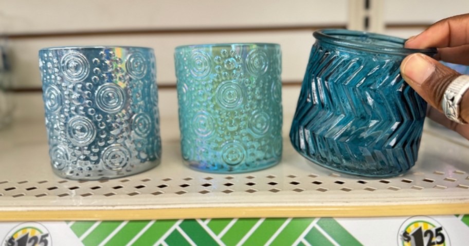 small votive candle holders in coastal blue colors and style onshelf