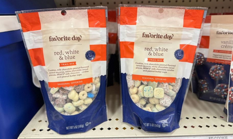 two packages of red white & blue trail mix on a store shelf