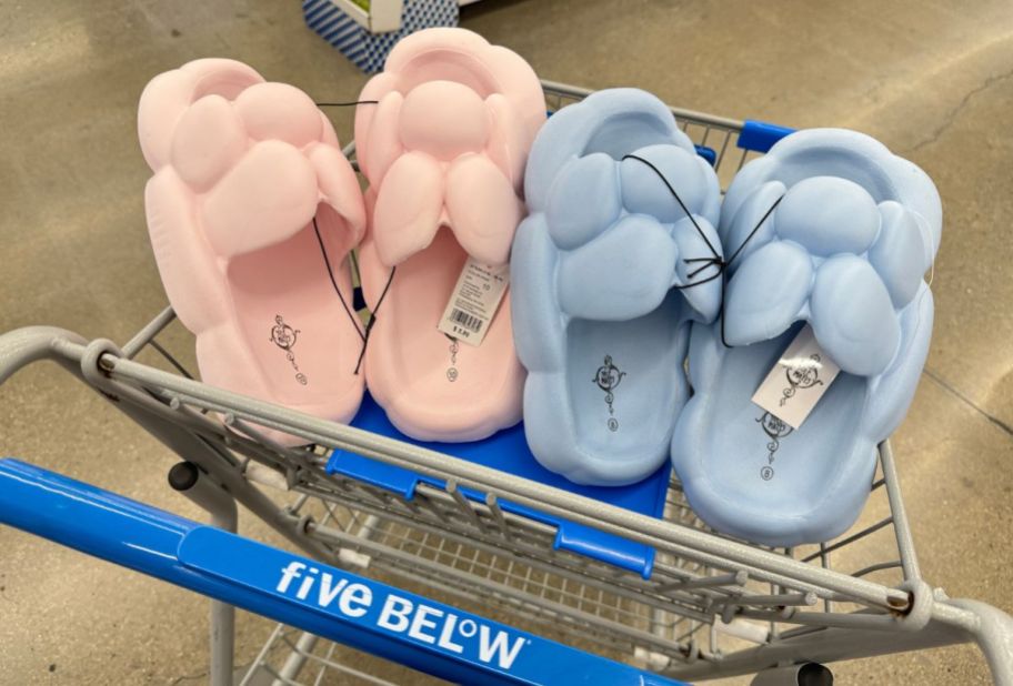 2 pair of ladies cloud slide in pink and blue in a shopping cart