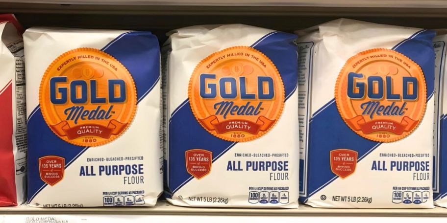 3 bags of gold medal flour sitting on shelf