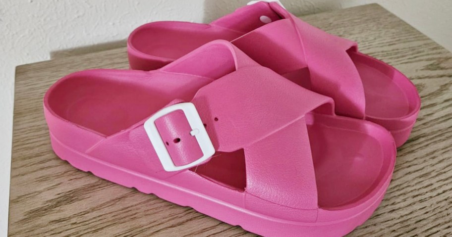 pink platform shoes on table