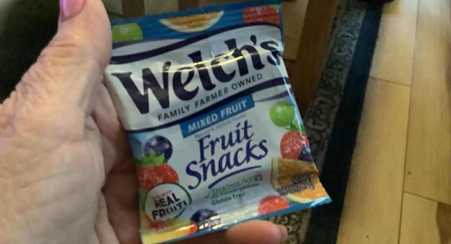 hand holding Welchs fruit snacks