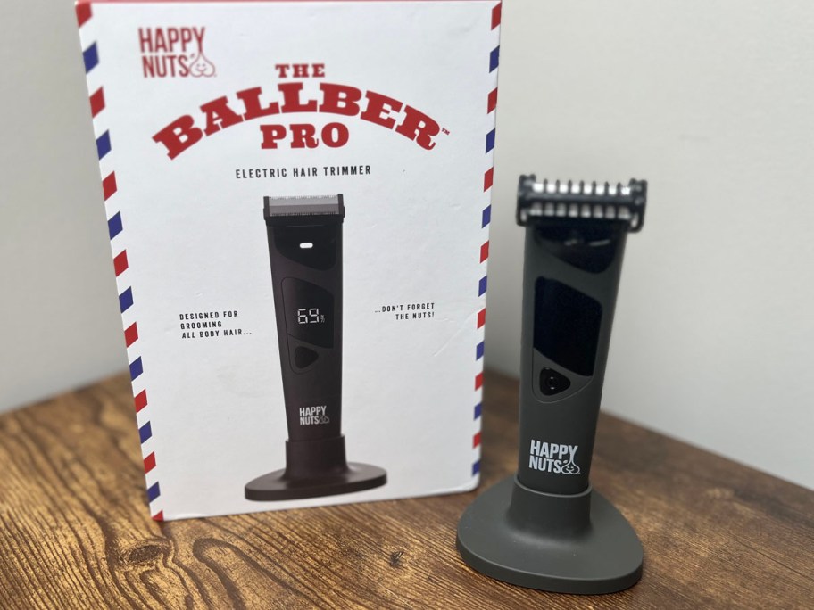 happy nuts ballber pro shaver on charger next to box