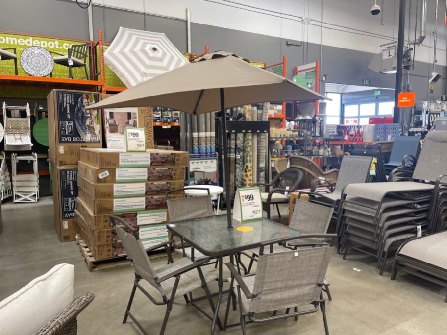 brown home depot patio set with umbrella in store