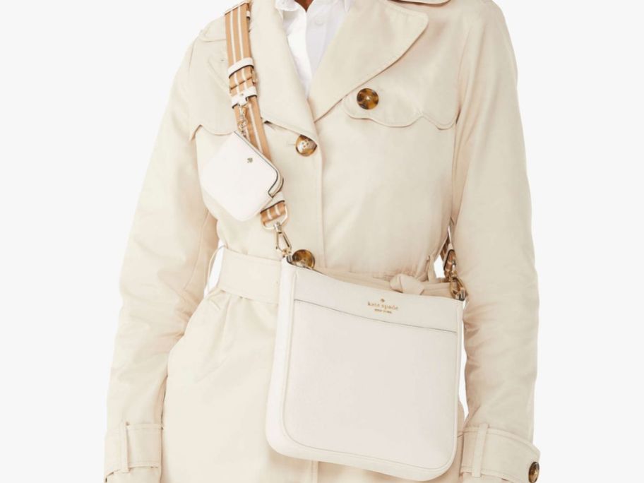 Stock image of a woman wearing a Kate Spade Crossbody Bag