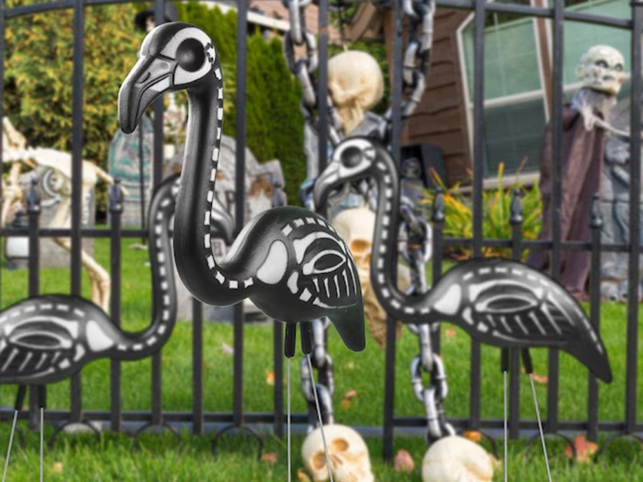 black halloween skeletons in yard 