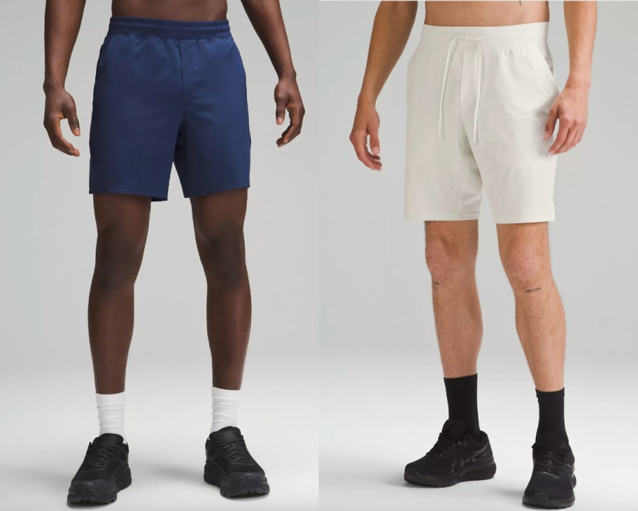 men in navy and tan shorts