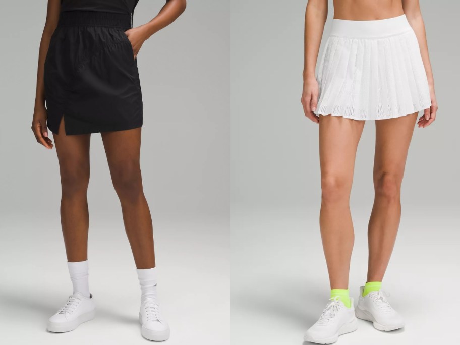 woman wearing a black short short and woman wearing a white tennis skirt