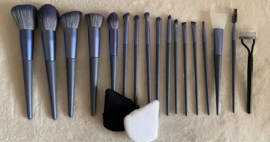 set up 20 luxbru brushes laying on mat