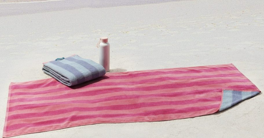 Beach towels on a beach.
