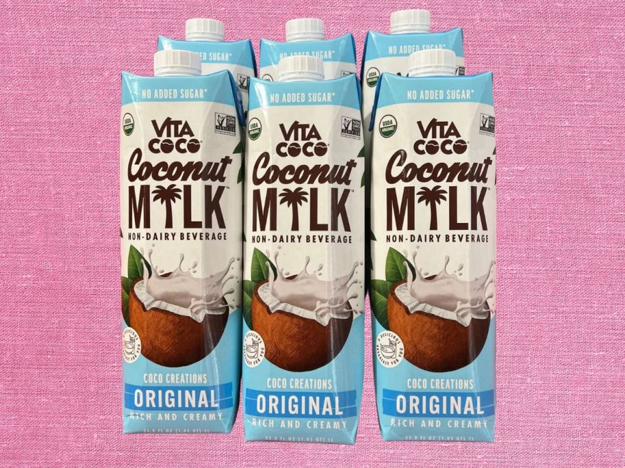 Vita Coco Original Organic Coconut Milk in front of pink background