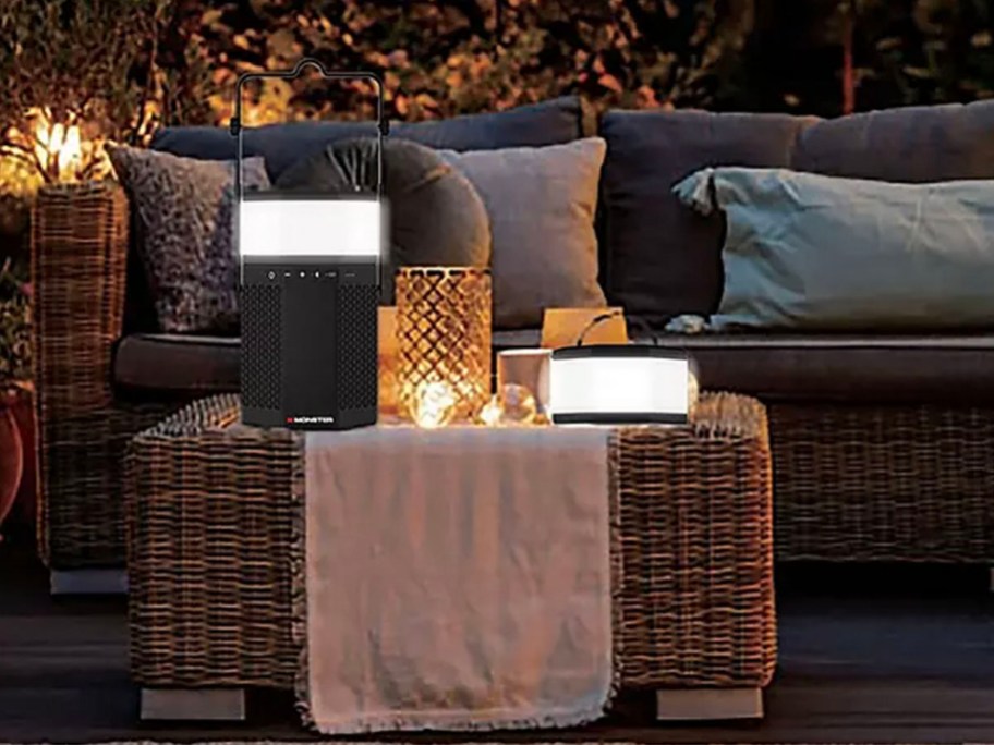 portable speaker with lights on table outdoors