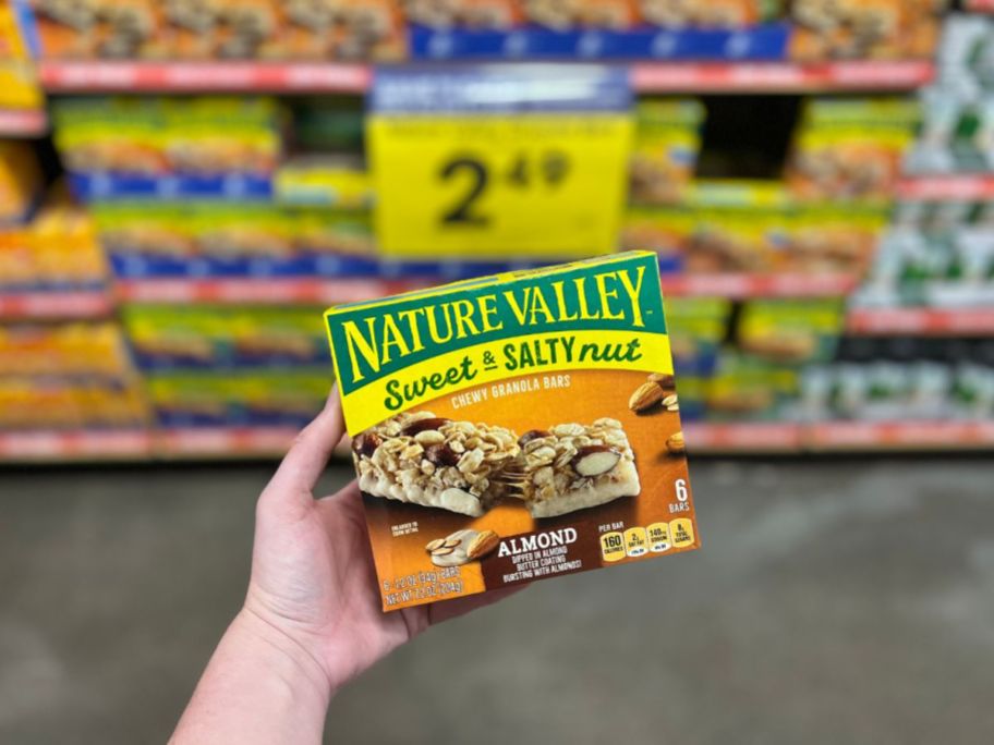 hand holding up nature valley bars