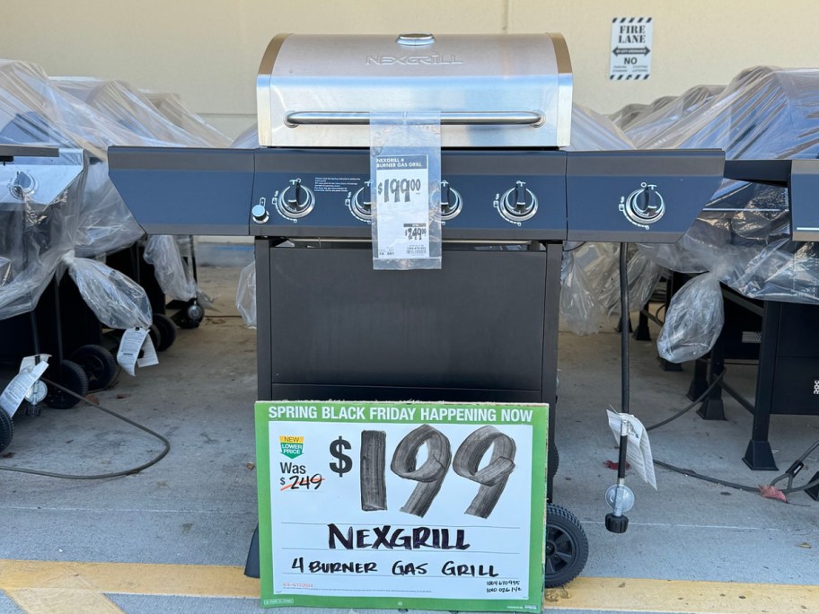 stainless steel and black nexgrill hoodie with sign outside home depot store
