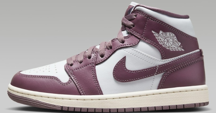 purplish pink and white women's Nike Air Jordan shoe