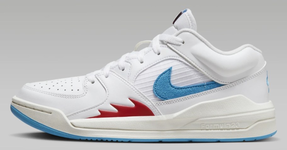 white Jordan women's shoe with blue and red accents