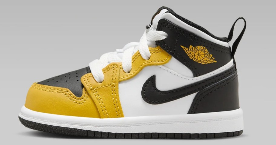 white, yellow and black toddler Nike Jordan shoe
