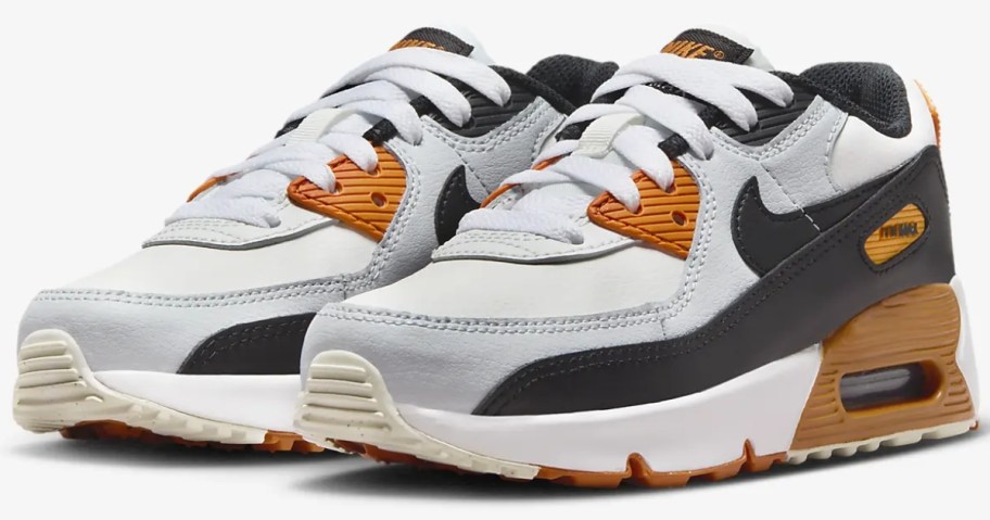 white, grey, orange and black kid's Nike Air Max shoes