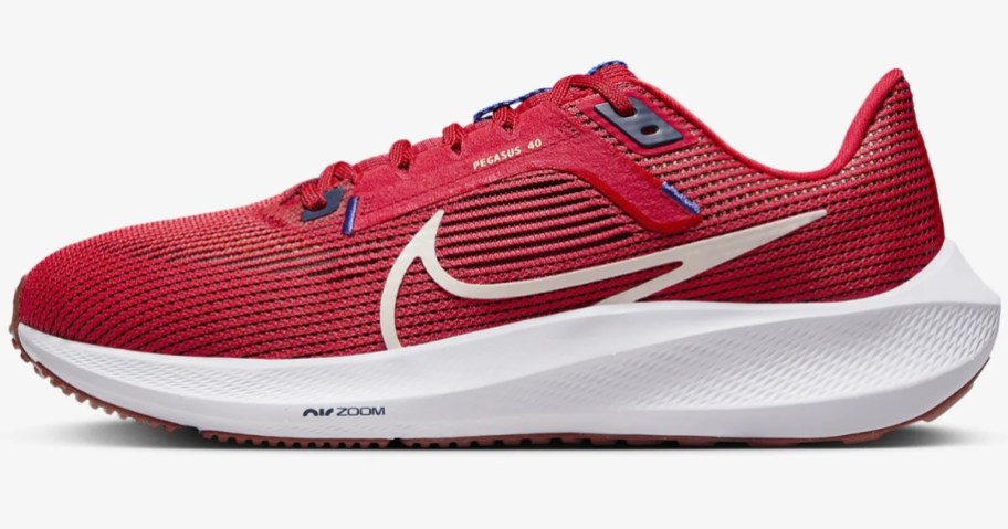 red and white men's Nike running shoe