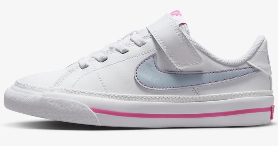 white, blue and pink kid's Nike shoe