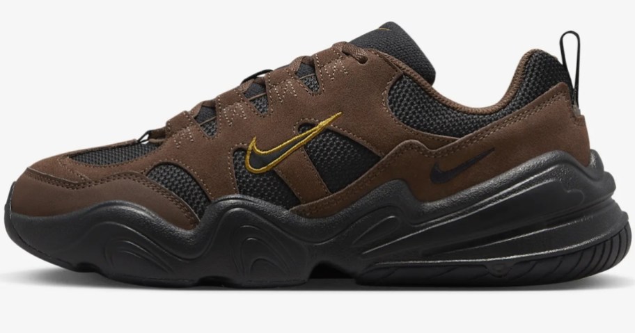 brown and black men's Nike shoe