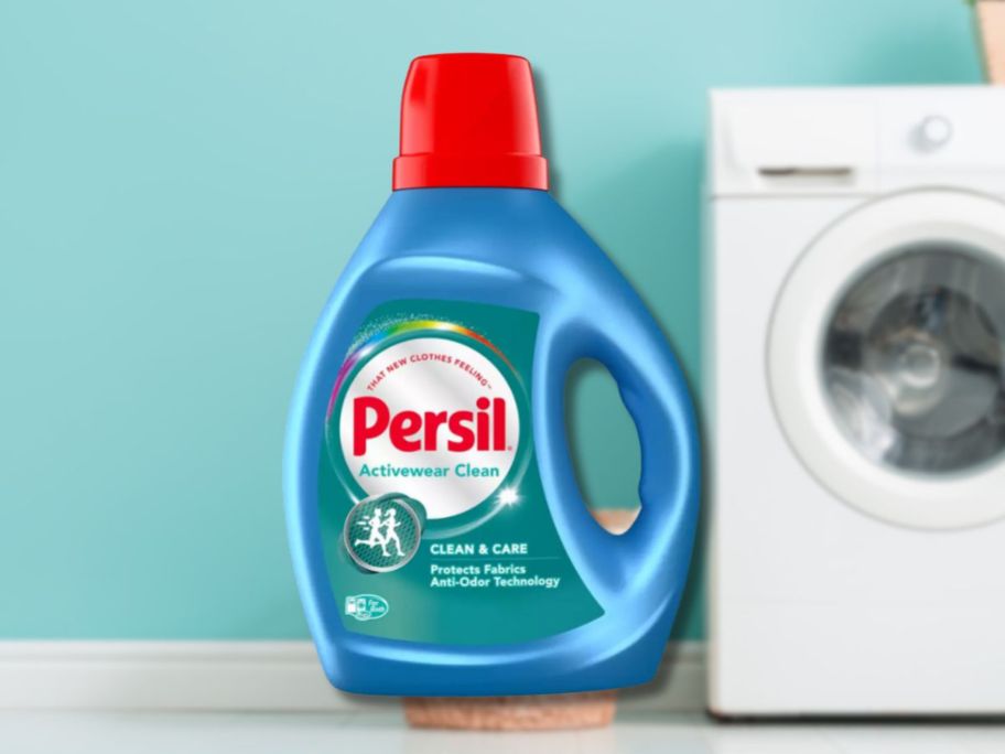 persil activewear with washing machine in background