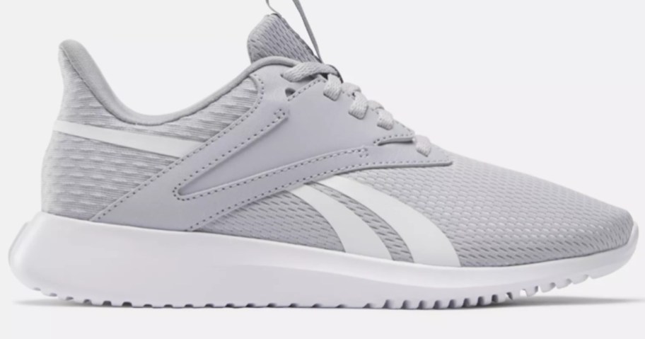 light grey and white women's Reebok running shoe
