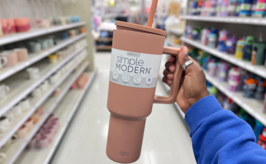 hand holding mauve simple modern tumbler in target store