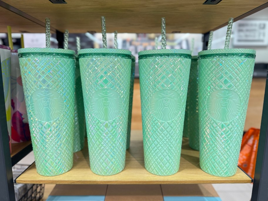 light green color Starbucks cold cup tumblers on shelf