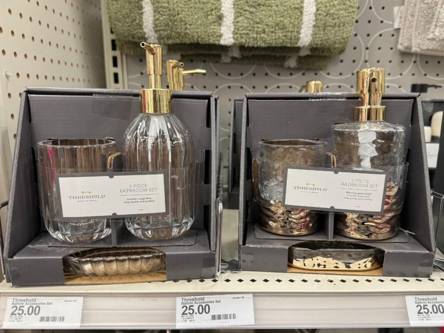 Threshold glass with gold accents bathroom soap dispenser, tumbler and dish set in box on shelf at Target