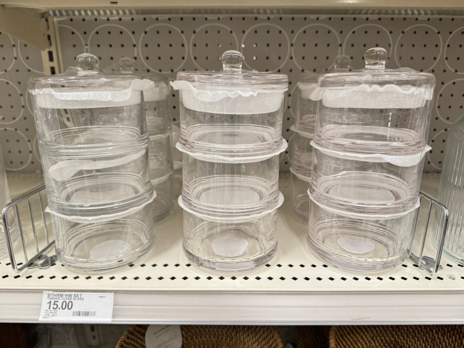 3 tier glass canister sets on display shelf