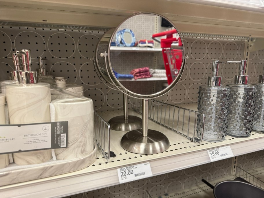 silver round vanity mirror on stand on display in Target