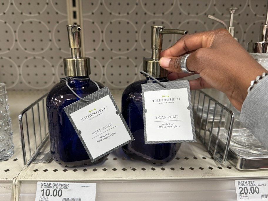 bathroom soap dispensers blue glass with silver pumps on shelf at Target