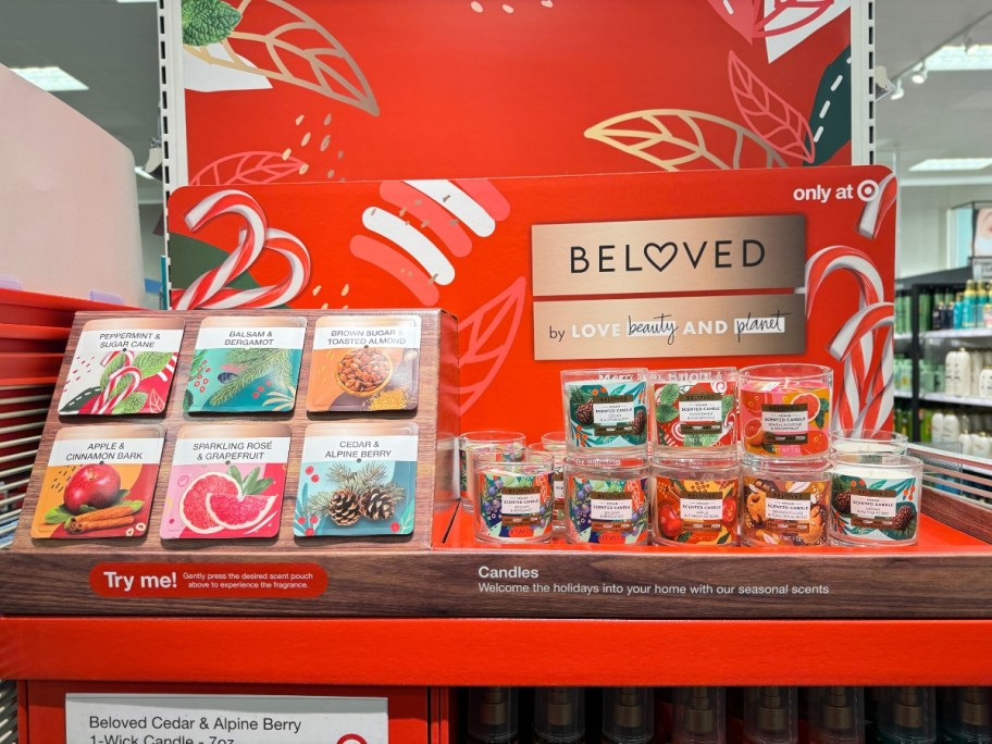 Beloved holiday display at Target with scent info and rows of candles