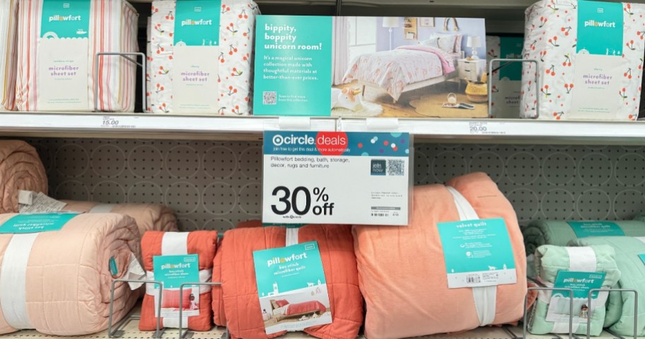 Pillowfort sheets and bedding sets on shelf with 30% off sale sign