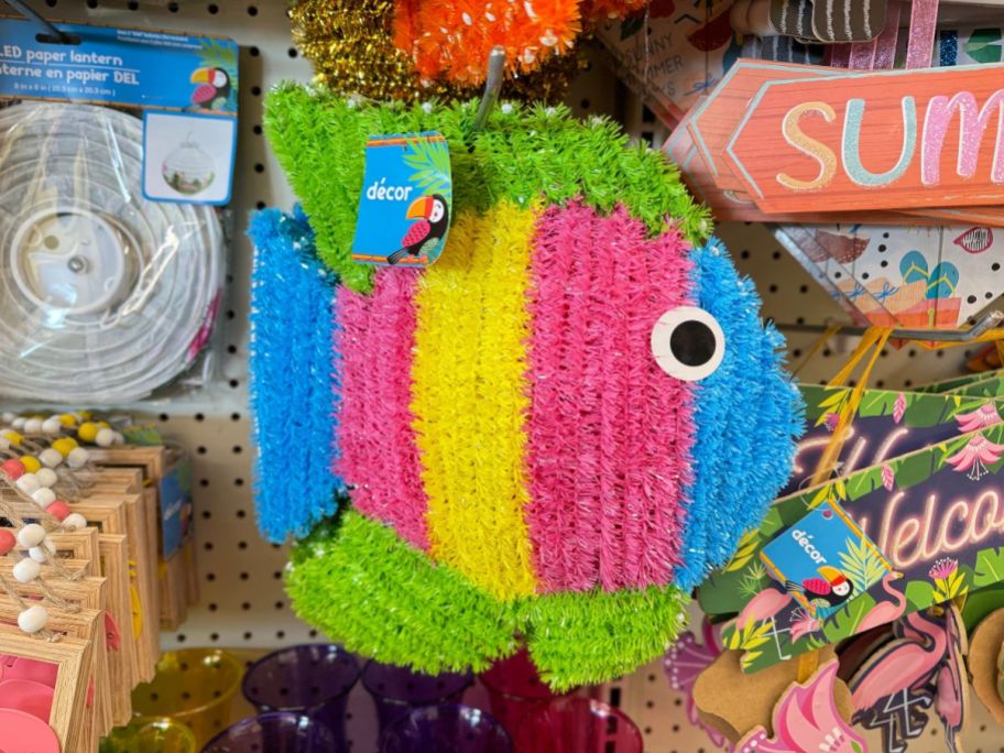 3d tinsel icon tropical fish on a store shelf