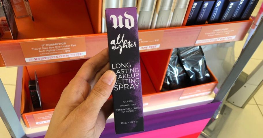 urban decay all nighter Waterproof Makeup Setting Spray box being held by hand on store