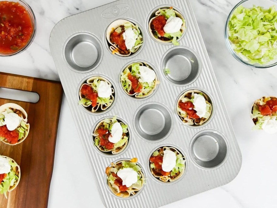 muffin pan full of mini tacos