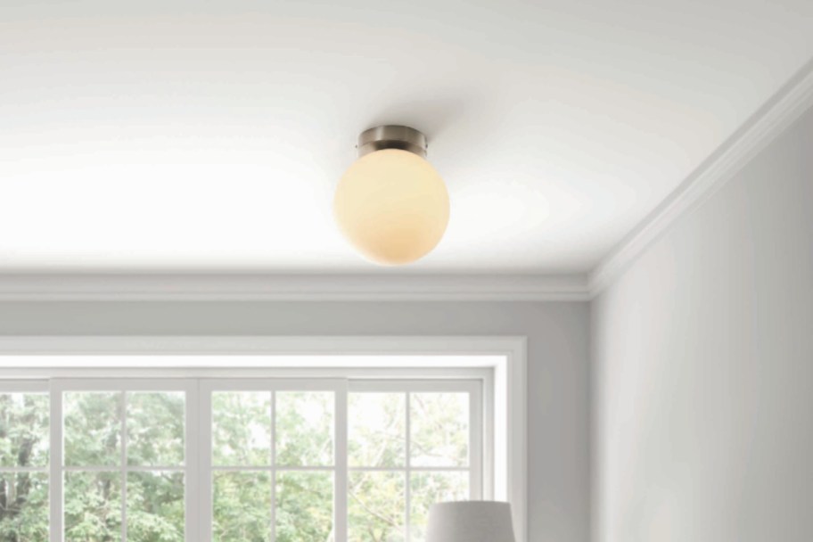 classic round light fixture on ceiling