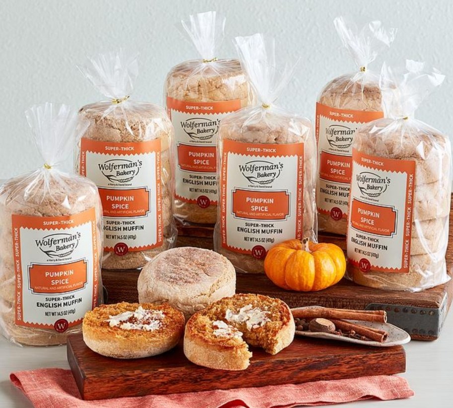 6 packages of bagels shown with a toasted sliced bagel