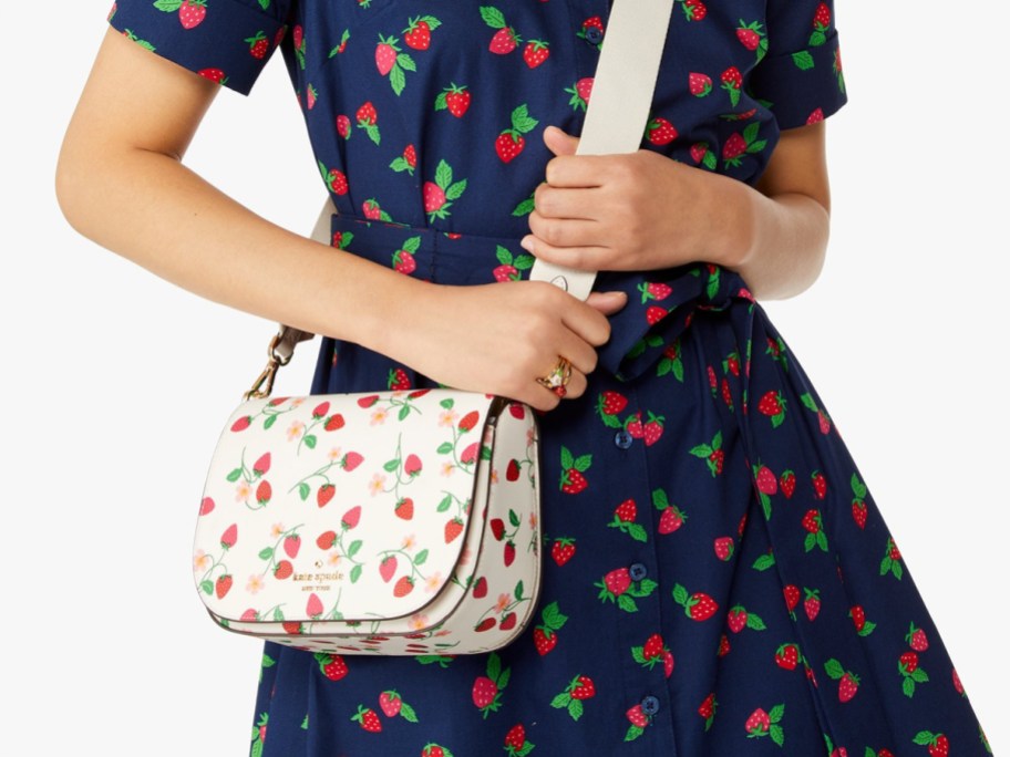 women wearing strawberry side bag with a strawberry dress