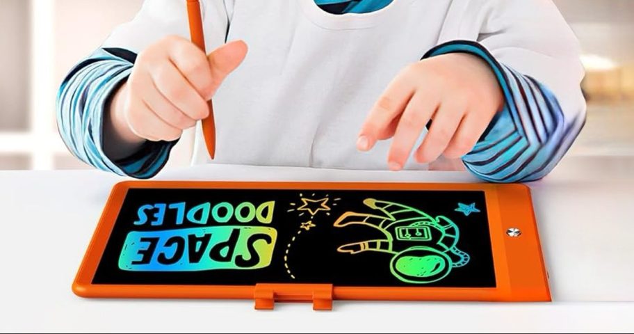 child using a 10in Magic Doodle Board