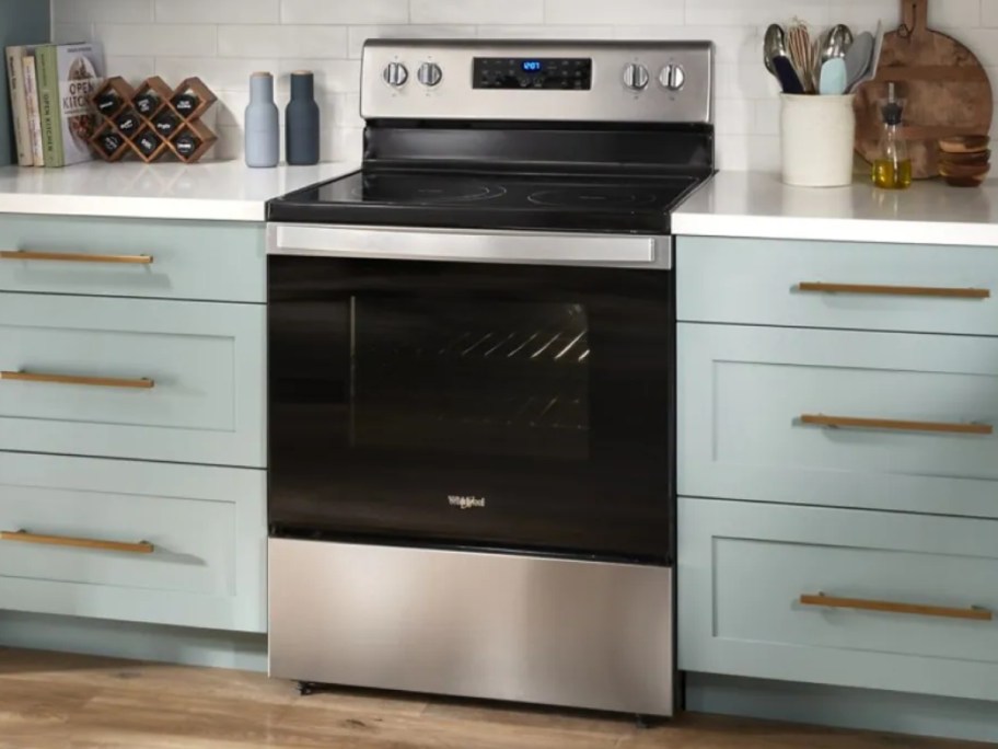 stainless steel and black oven in a kitchen