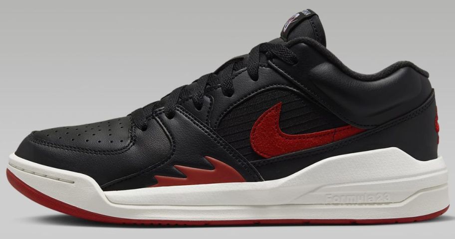 women's Nike Jordan stadium style shoe in black with white and red accents