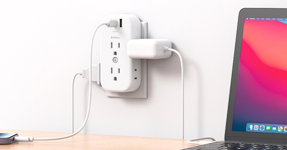 laptop and iphone plugged into outlet extender