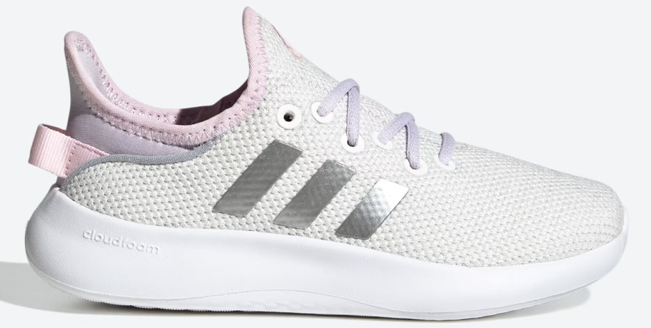 white, silver, and light pink adidas shoe