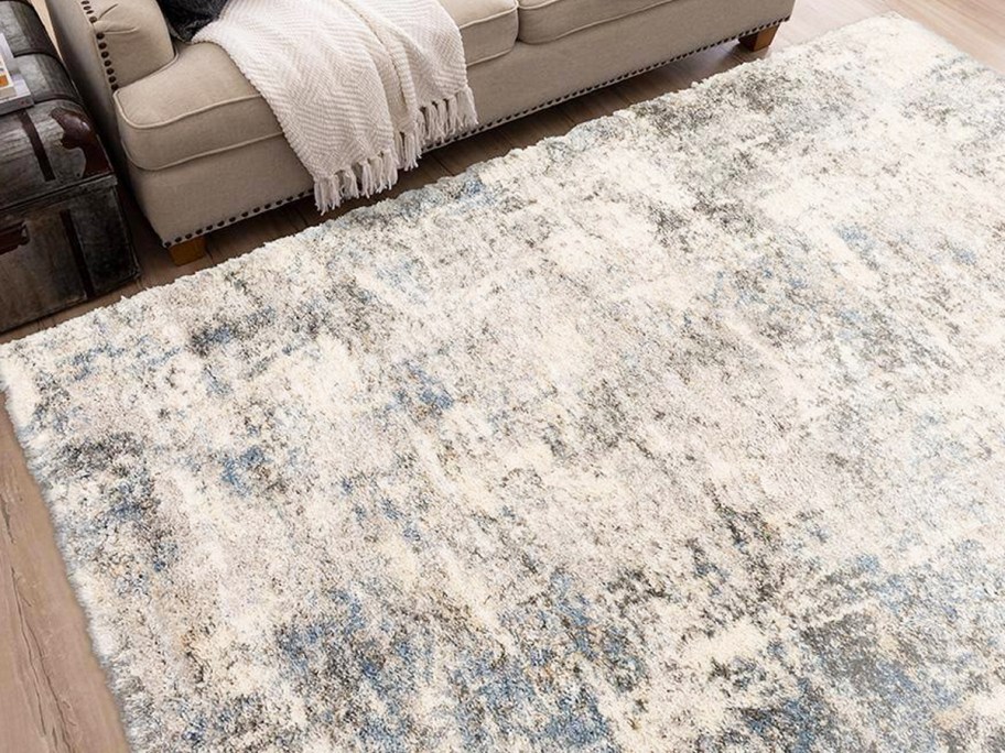 white, grey, and blue abstract area rug