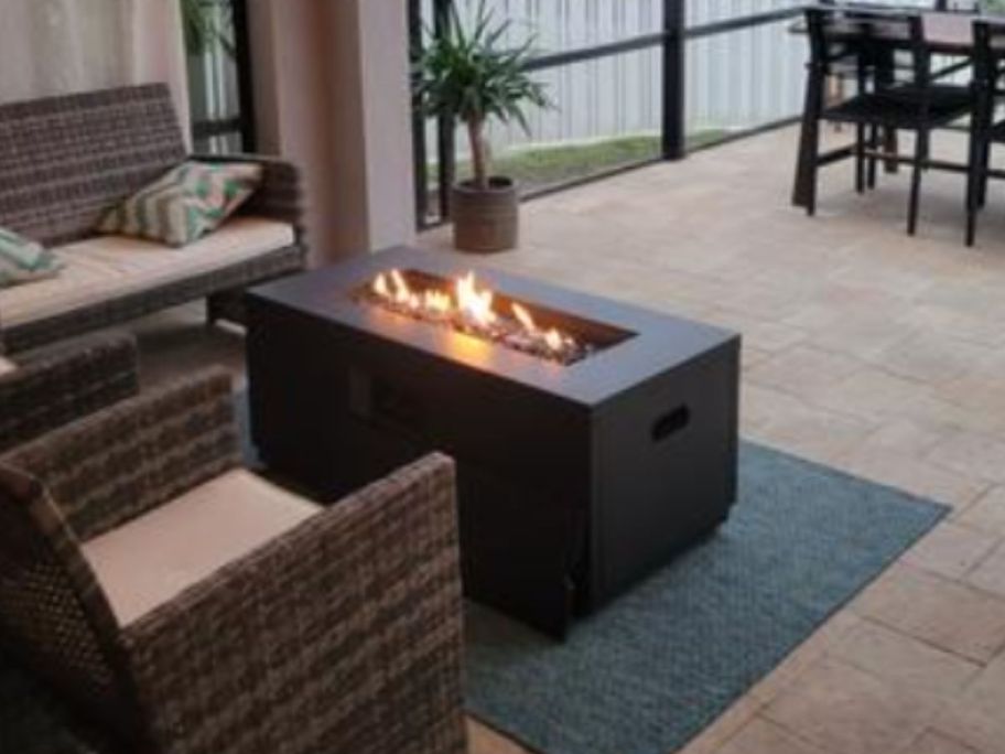 Better Homes & Gardens Rectangle Gas Fire Pit on patio